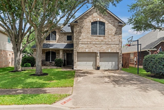 9024 Wildwater Way, Round Rock, TX 78681 - traditional-style home with a front lawn, an attached garage, concrete driveway, and brick siding