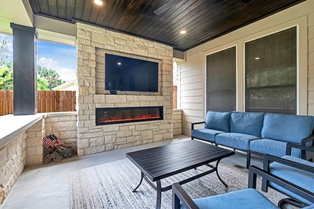 9024 Wildwater Way, Round Rock, TX 78681 - view of patio featuring an outdoor living space with a fireplace