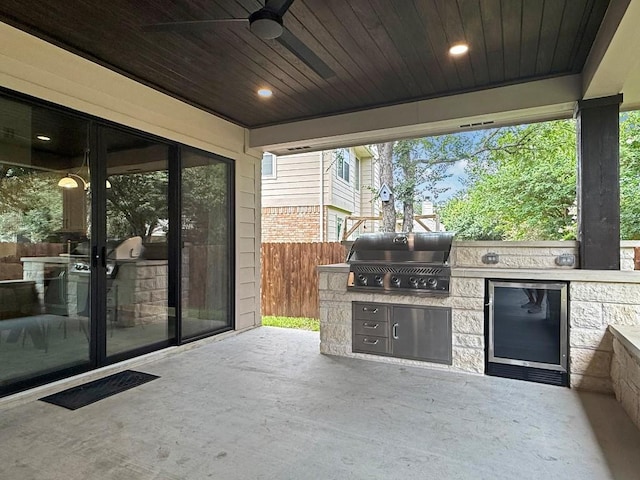 9024 Wildwater Way, Round Rock, TX 78681 - view of patio / terrace featuring an outdoor kitchen and a ceiling fan
