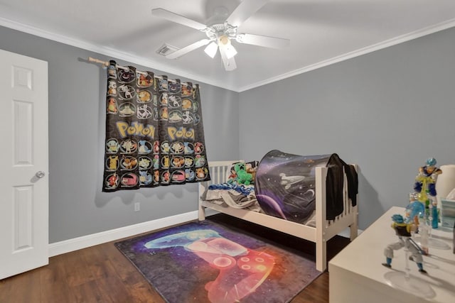 9024 Wildwater Way, Round Rock, TX 78681 - bedroom with wood finished floors, crown molding, and ceiling fan
