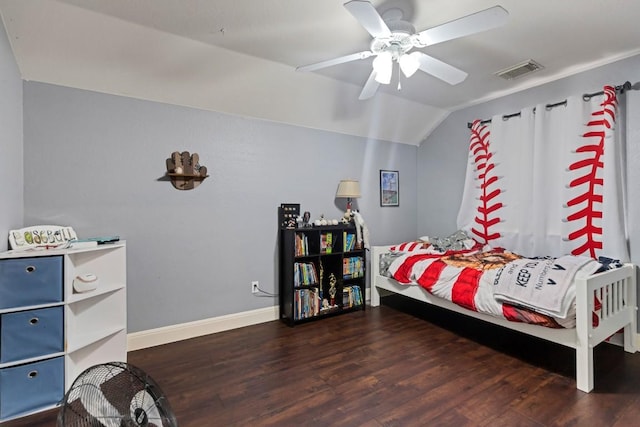 9024 Wildwater Way, Round Rock, TX 78681 - bedroom with wood finished floors, vaulted ceiling, and ceiling fan
