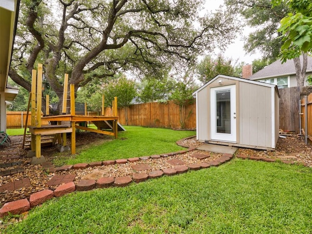 910 Blue Spring Cir, Round Rock, TX 78681 - fenced backyard with a storage unit