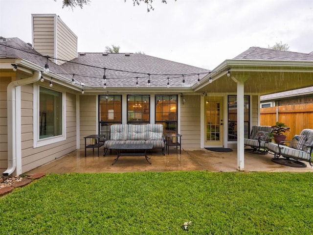 910 Blue Spring Cir, Round Rock, TX 78681 - back of property featuring outdoor lounge area, a patio, roof with shingles, and a chimney
