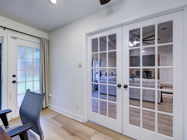 910 Blue Spring Cir, Round Rock, TX 78681 - unfurnished office featuring french doors, wood finished floors, and a ceiling fan