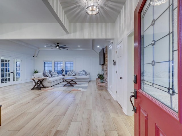 910 Blue Spring Cir, Round Rock, TX 78681 - foyer with light wood finished floors, a decorative wall, french doors, ceiling fan, and beamed ceiling