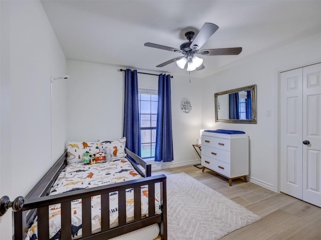910 Blue Spring Cir, Round Rock, TX 78681 - bedroom featuring light wood-type flooring and a ceiling fan