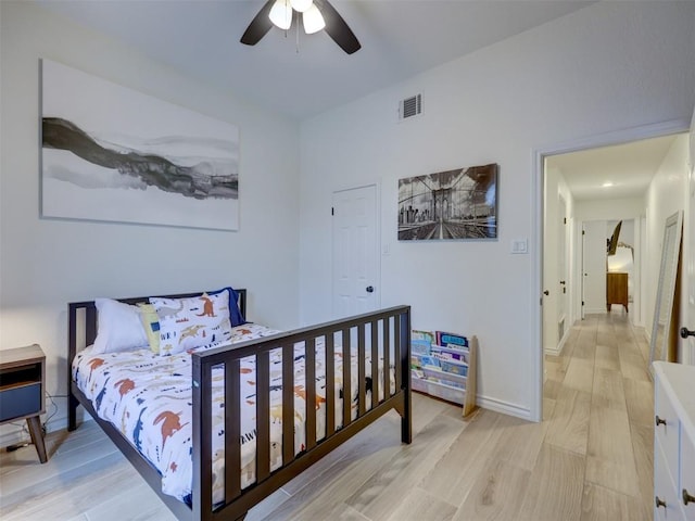 910 Blue Spring Cir, Round Rock, TX 78681 - bedroom featuring light wood finished floors and ceiling fan