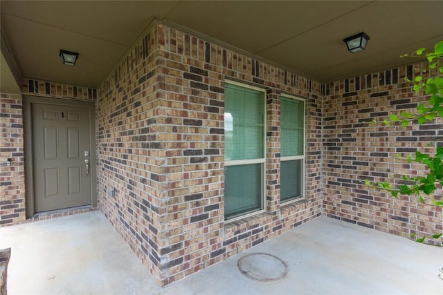 232 Reagor Dr, Taylor, TX 76574 - entrance to property with brick siding