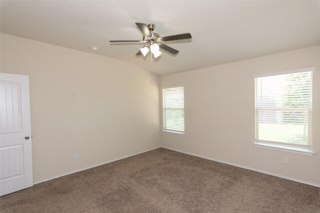 232 Reagor Dr, Taylor, TX 76574 - empty room with carpet, a ceiling fan, vaulted ceiling, and a smoke detector