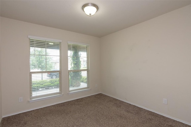 232 Reagor Dr, Taylor, TX 76574 - unfurnished room with carpet and baseboards
