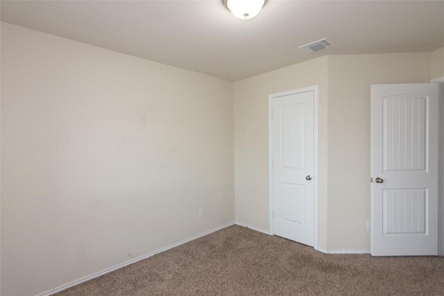 232 Reagor Dr, Taylor, TX 76574 - unfurnished bedroom with carpet and baseboards