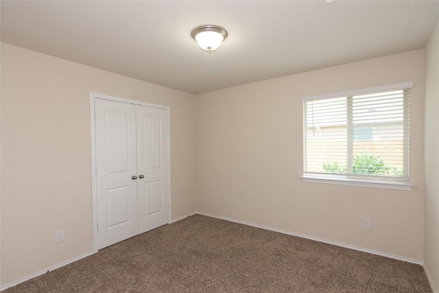 232 Reagor Dr, Taylor, TX 76574 - unfurnished bedroom featuring carpet flooring and a closet