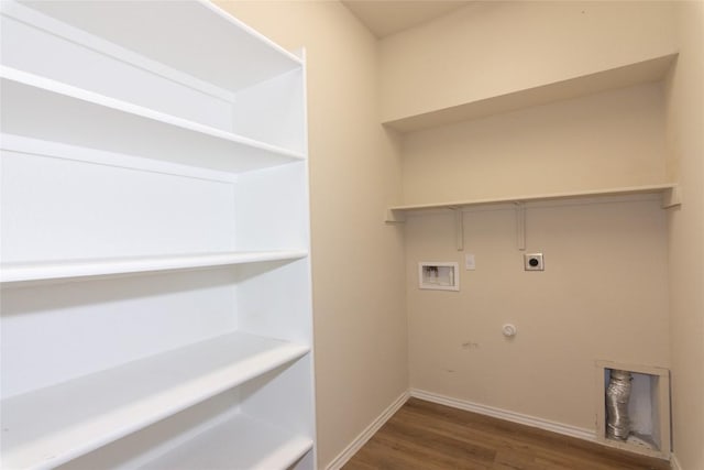 232 Reagor Dr, Taylor, TX 76574 - laundry room with electric dryer hookup, hookup for a washing machine, wood finished floors, and gas dryer hookup