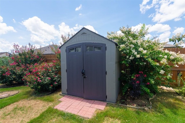 232 Reagor Dr, Taylor, TX 76574 - view of shed featuring a fenced backyard