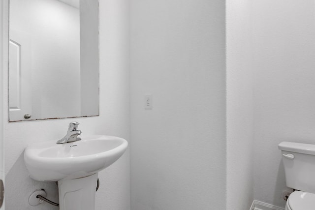 19512 Andrew Jackson St, Manor, TX 78653 - bathroom featuring toilet and a sink