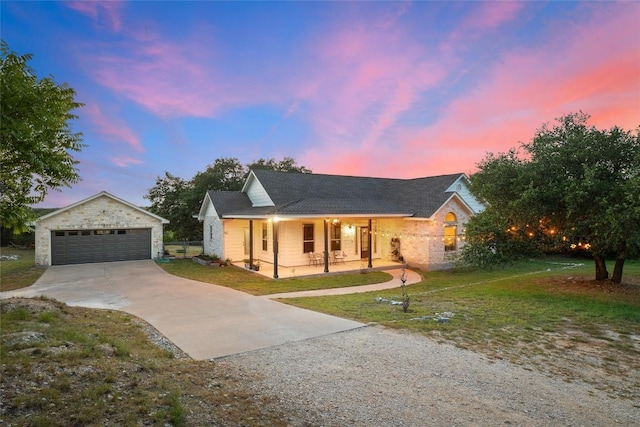 28 Long Creek Rd, Austin, TX 78737 - view of front of home featuring covered porch, an outdoor structure, driveway, and a front yard