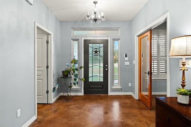 28 Long Creek Rd, Austin, TX 78737 - foyer featuring concrete flooring and a chandelier