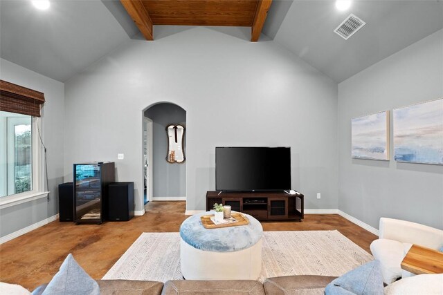 28 Long Creek Rd, Austin, TX 78737 - living area featuring arched walkways, beamed ceiling, and high vaulted ceiling