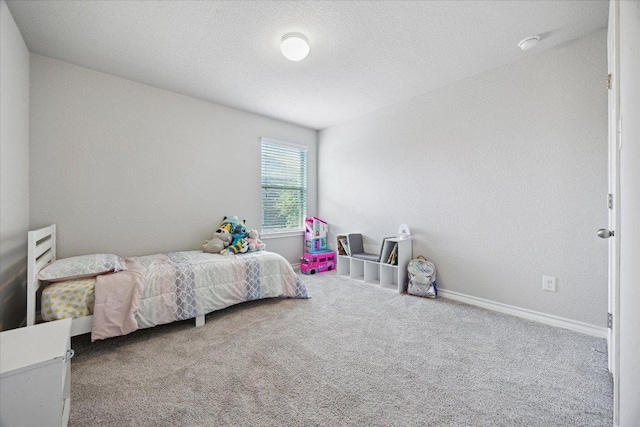 604 John Muir Trl, Leander, TX 78641 - bedroom featuring carpet floors and baseboards