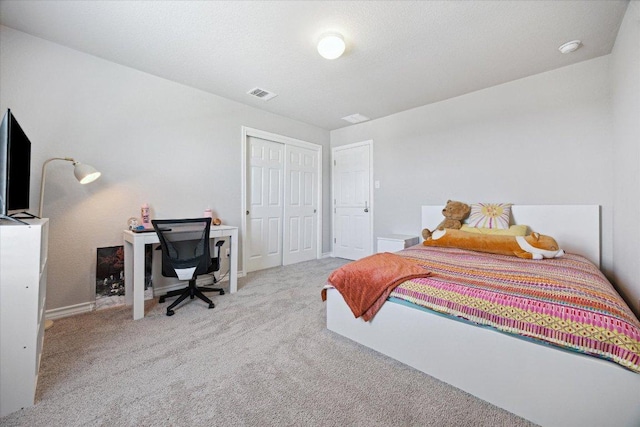 604 John Muir Trl, Leander, TX 78641 - carpeted bedroom featuring a desk and a closet