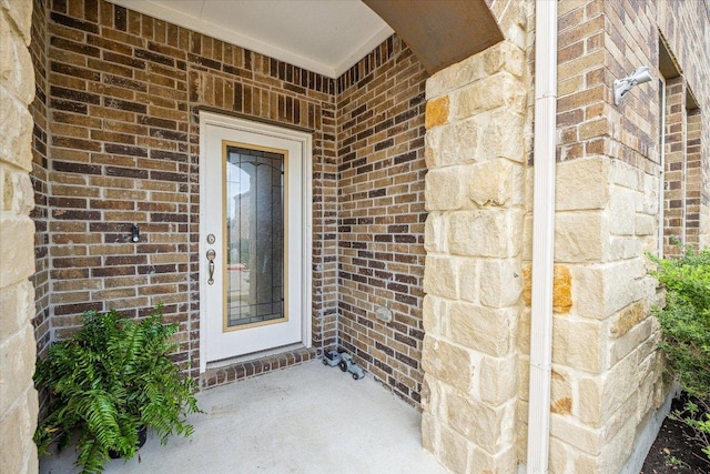 604 John Muir Trl, Leander, TX 78641 - view of exterior entry featuring brick siding