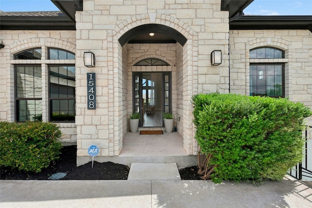 15408 Joseph Dr, Austin, TX 78734 - doorway to property featuring stone siding