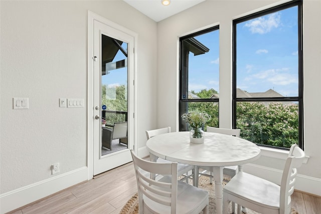 15408 Joseph Dr, Austin, TX 78734 - dining room with light wood-style floors and baseboards