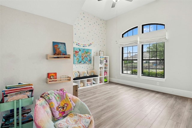 15408 Joseph Dr, Austin, TX 78734 - playroom featuring wood finished floors, a ceiling fan, and a towering ceiling