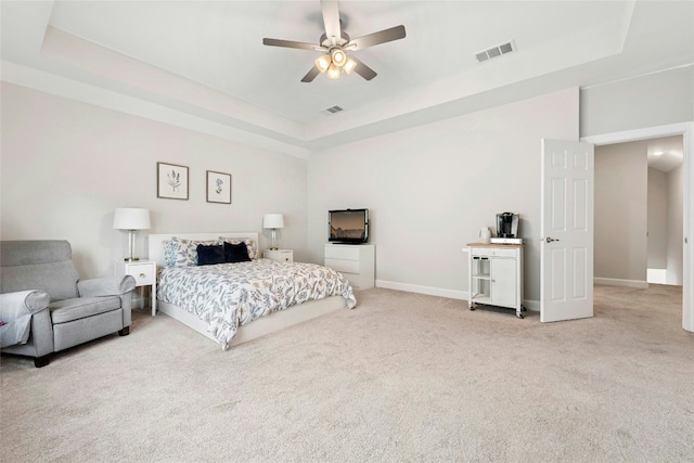 15408 Joseph Dr, Austin, TX 78734 - bedroom with a raised ceiling, light colored carpet, and ceiling fan