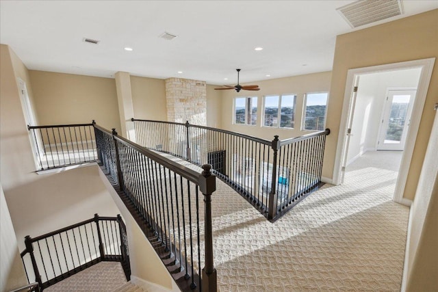 3207 Crystal Falls Pkwy, Leander, TX 78641 - stairs with carpet floors, ceiling fan, and recessed lighting