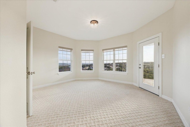 3207 Crystal Falls Pkwy, Leander, TX 78641 - spare room featuring light carpet and healthy amount of natural light
