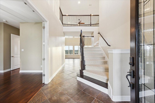 3207 Crystal Falls Pkwy, Leander, TX 78641 - foyer entrance featuring stairs and a high ceiling