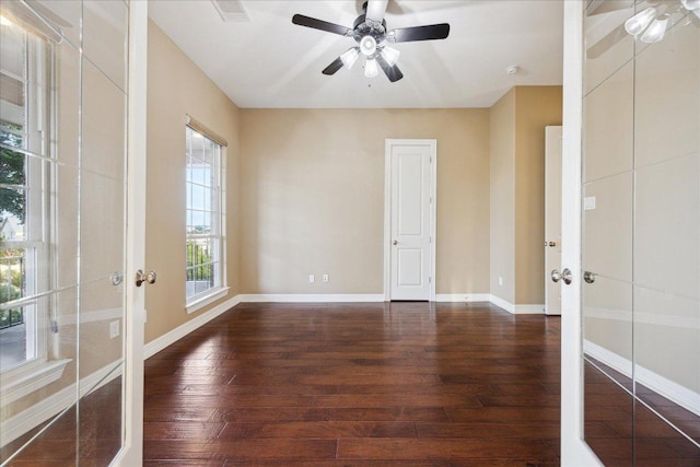 3207 Crystal Falls Pkwy, Leander, TX 78641 - spare room featuring a ceiling fan, wood-type flooring, and french doors