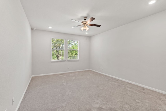127 Tom Kite Dr, Burnet, TX 78611 - spare room featuring a ceiling fan, recessed lighting, and carpet