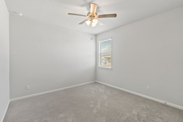 127 Tom Kite Dr, Burnet, TX 78611 - spare room featuring carpet and a ceiling fan