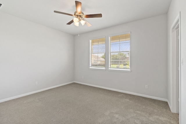 127 Tom Kite Dr, Burnet, TX 78611 - unfurnished bedroom featuring carpet floors and ceiling fan