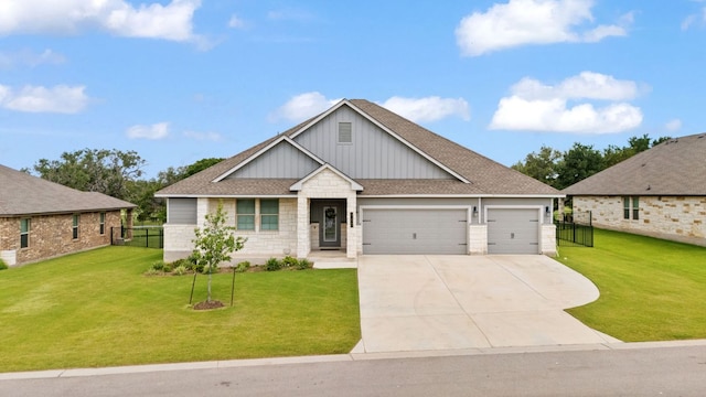 127 Tom Kite Dr, Burnet, TX 78611 - craftsman-style home featuring board and batten siding, a garage, driveway, stone siding, and roof with shingles