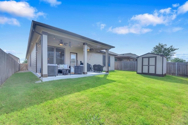 14200 James Garfield St, Manor, TX 78653 - back of property featuring outdoor lounge area, a ceiling fan, a fenced backyard, and a patio