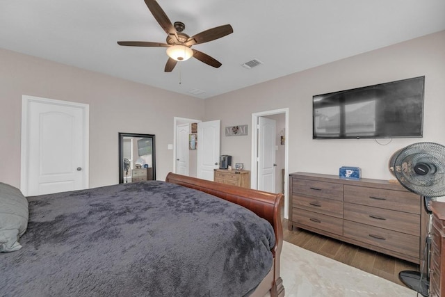 14200 James Garfield St, Manor, TX 78653 - bedroom with wood finished floors and ceiling fan