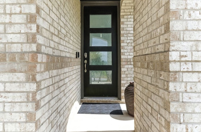 8100 Copper Prairie Bnd, Lago Vista, TX 78645 - entrance to property with brick siding