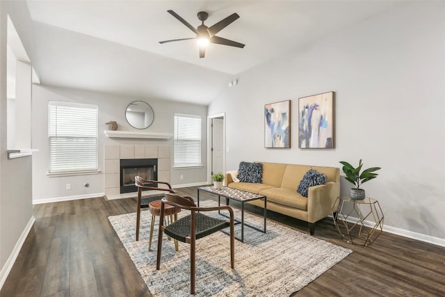 216 Watergate Way, Hutto, TX 78634 - living room with wood finished floors, ceiling fan, a fireplace, and lofted ceiling