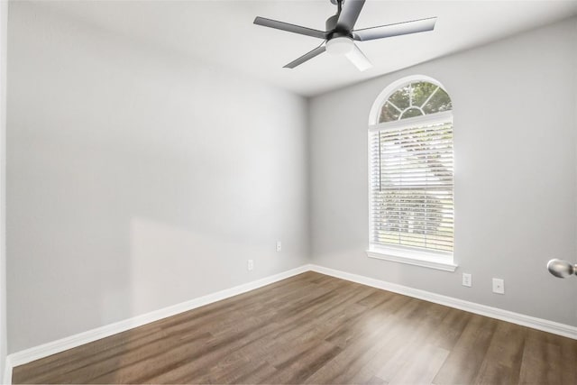 216 Watergate Way, Hutto, TX 78634 - unfurnished room with dark wood-style flooring and a ceiling fan
