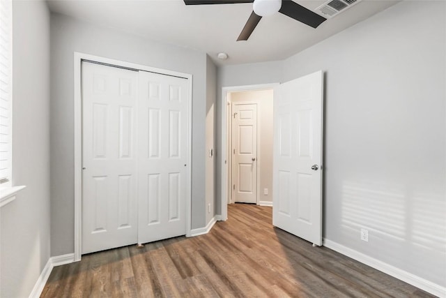 216 Watergate Way, Hutto, TX 78634 - unfurnished bedroom with wood finished floors, a closet, and ceiling fan