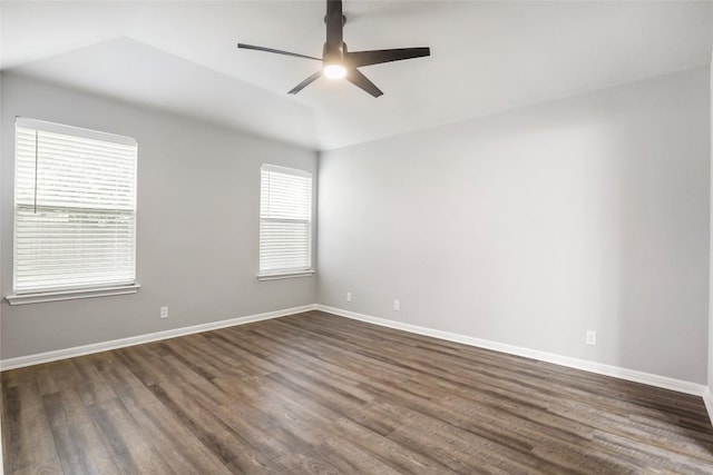 216 Watergate Way, Hutto, TX 78634 - spare room with a ceiling fan, dark wood finished floors, and lofted ceiling