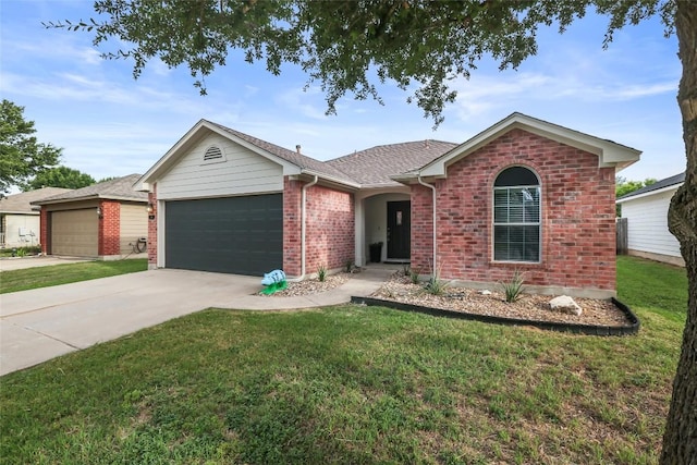216 Watergate Way, Hutto, TX 78634 - ranch-style home with a garage, driveway, and a front yard