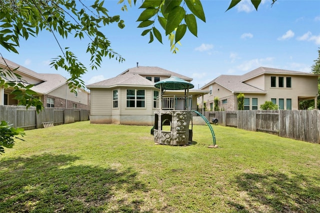 2309 Lone Spur Cv, Round Rock, TX 78665 - rear view of property featuring a fenced backyard