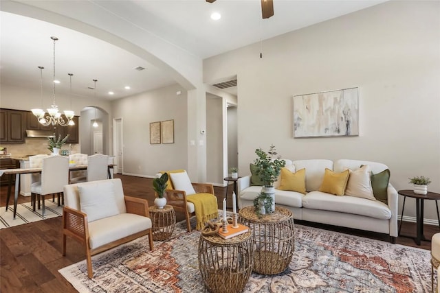 1821 Cherry Glade Trl, Georgetown, TX 78628 - living room featuring arched walkways, a ceiling fan, recessed lighting, and wood finished floors