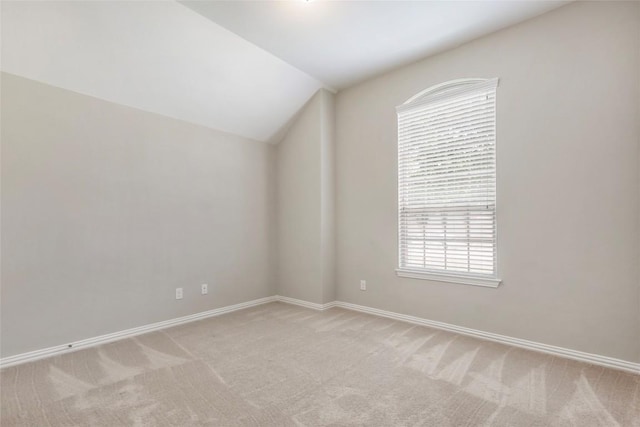 1821 Cherry Glade Trl, Georgetown, TX 78628 - spare room with light carpet and vaulted ceiling