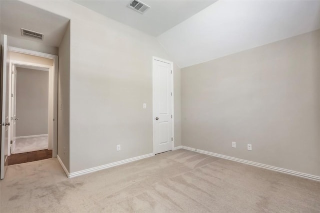1821 Cherry Glade Trl, Georgetown, TX 78628 - unfurnished bedroom with light colored carpet and lofted ceiling