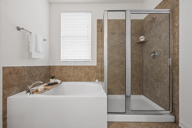 1267 Sanders, Kyle, TX 78640 - full bathroom with a shower stall and a garden tub